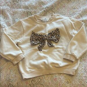 H&M Cream Sweatshirt with Leopard Bow Accent